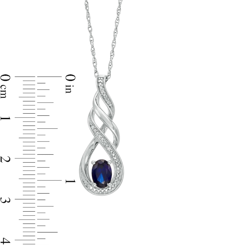 Oval Lab-Created Blue Sapphire and Diamond Accent Cascading Open Flame Pendant in Sterling Silver