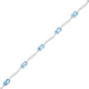 Oval Swiss Blue Topaz and Diamond Accent Wave Link Bracelet in Sterling Silver - 7.25"
