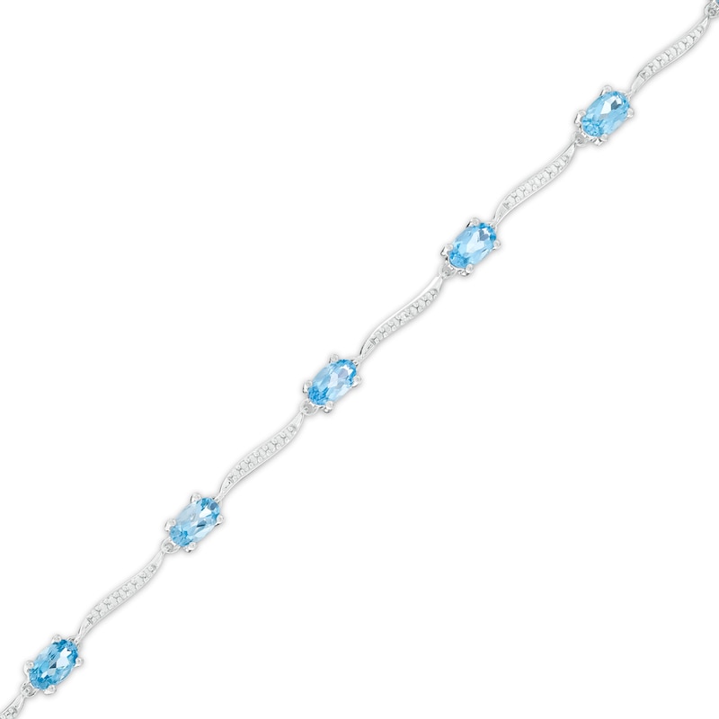 Oval Swiss Blue Topaz and Diamond Accent Wave Link Bracelet in Sterling Silver - 7.25"