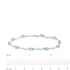 Oval Swiss Blue Topaz and Diamond Accent Wave Link Bracelet in Sterling Silver - 7.25"