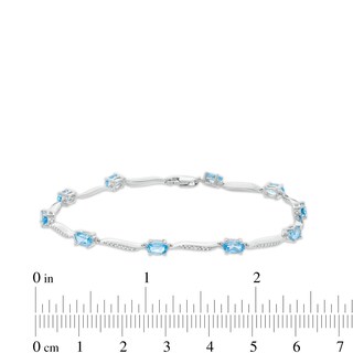 Oval Swiss Blue Topaz and Diamond Accent Wave Link Bracelet in Sterling Silver - 7.25"