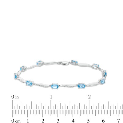 Oval Swiss Blue Topaz and Diamond Accent Wave Link Bracelet in Sterling Silver - 7.25"