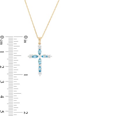Marquise Swiss Blue Topaz and 0.08 CT. T.W. Diamond Cross Pendant in 10K Gold