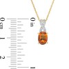 Thumbnail Image 3 of Oval Madeira Citrine and 0.04 CT. T.W. Diamond "X" Drop Pendant in 10K Gold