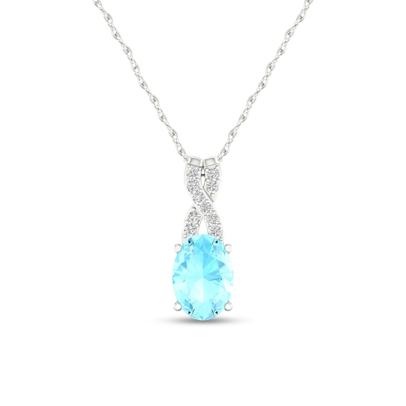Oval Aquamarine and 0.04 CT. T.W. Diamond "X" Drop Pendant in 10K White Gold