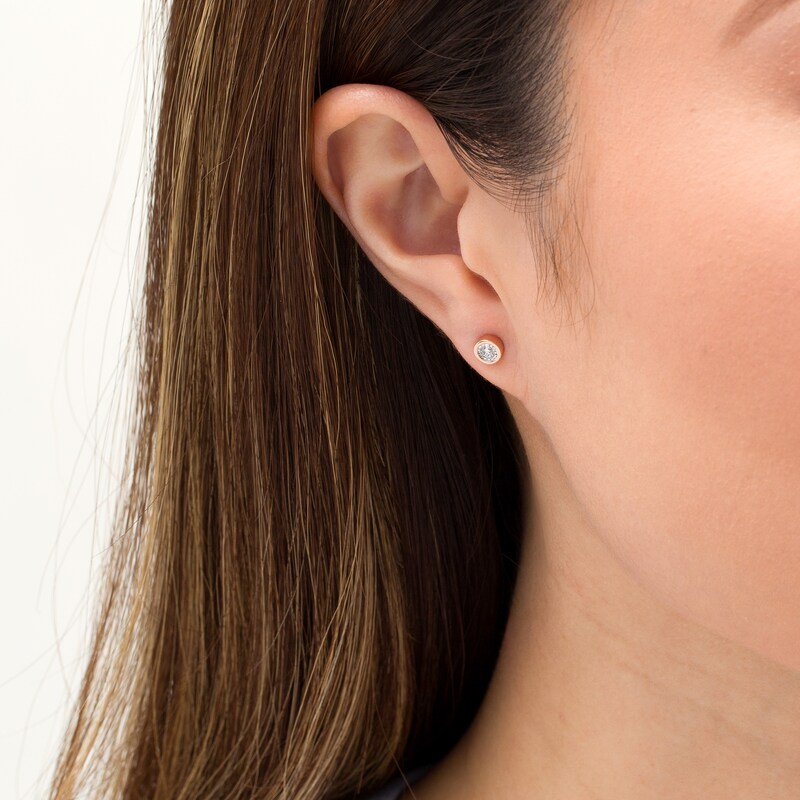 Main Image 2 of 0.10 CT. T.W. Diamond Solitaire Stud Earrings in 10K Rose Gold