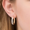 Thumbnail Image 1 of Italian Gold Glitter Enamel Oval Hoop Earrings in 14K Gold