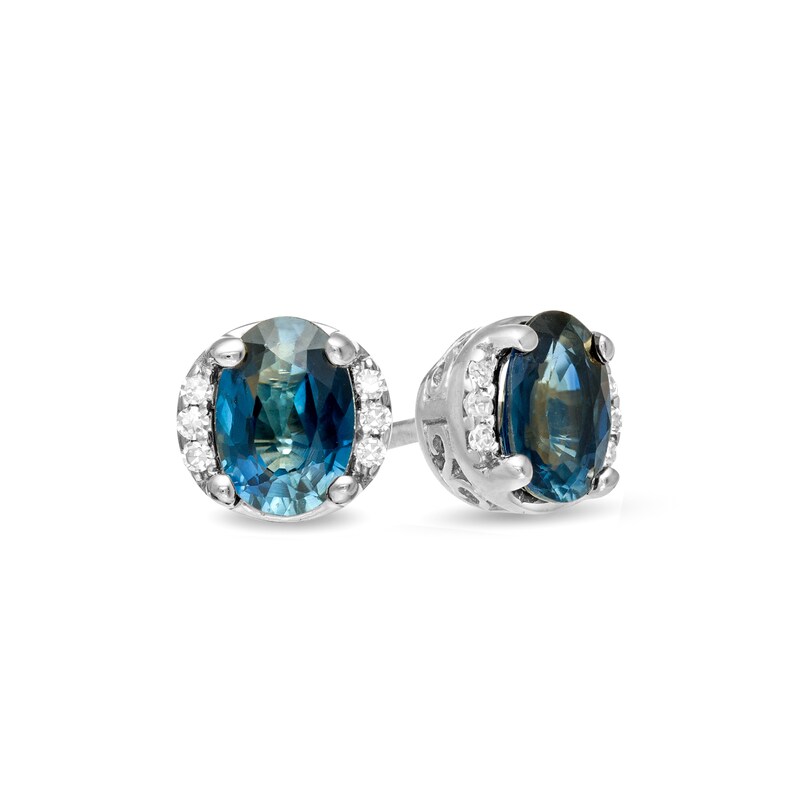 Main Image 1 of Oval Blue Sapphire and 0.04 CT. T.W. Diamond Collar Stud Earrings in 10K Gold