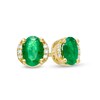 Thumbnail Image 1 of Oval Emerald and 0.04 CT. T.W. Diamond Collar Stud Earrings in 10K Gold