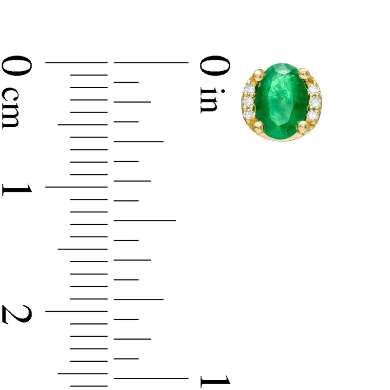 Oval Emerald and 0.04 CT. T.W. Diamond Collar Stud Earrings in 10K Gold