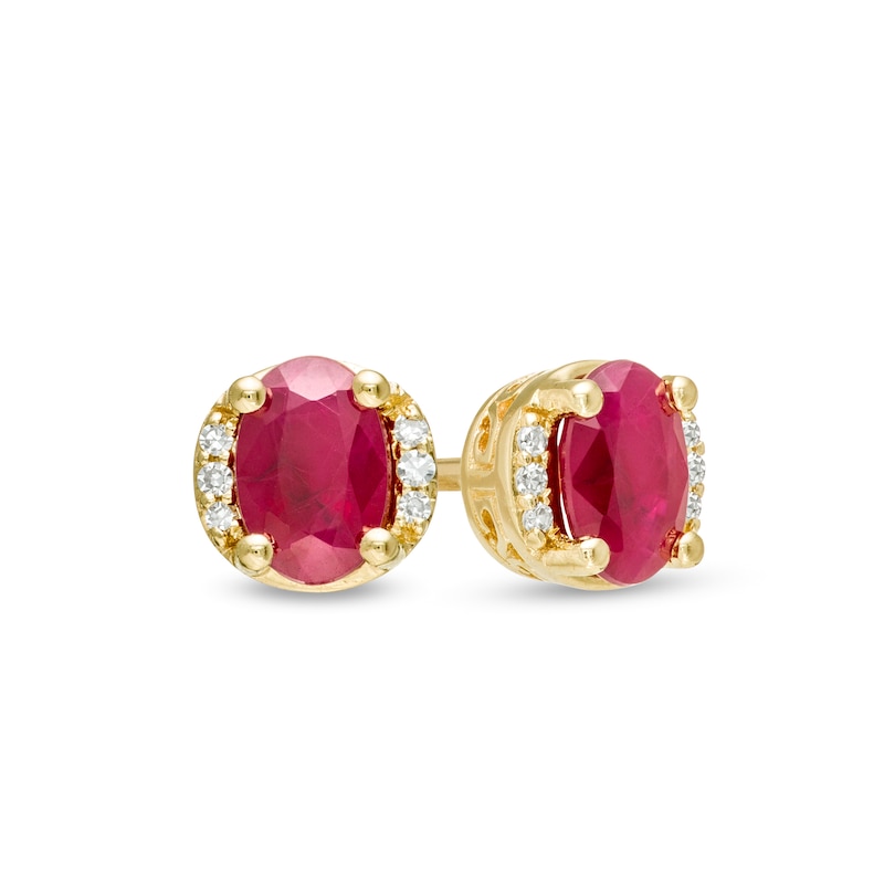 Oval Ruby and 0.04 CT. T.W. Diamond Collar Stud Earrings in 10K Gold