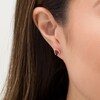 Thumbnail Image 2 of Oval Ruby and 0.04 CT. T.W. Diamond Collar Stud Earrings in 10K Gold