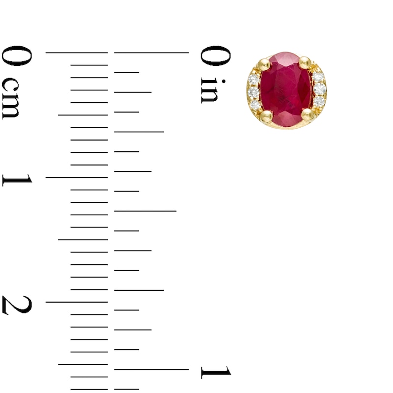 Oval Ruby and 0.04 CT. T.W. Diamond Collar Stud Earrings in 10K Gold