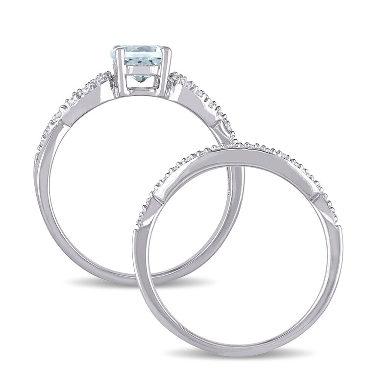 6.0mm Aquamarine and 0.148 CT. T.W. Diamond Infinity Shank Bridal Set in 10K White Gold