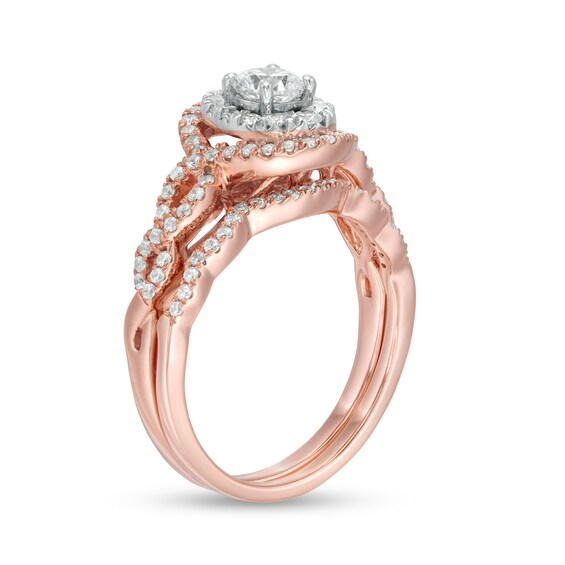 0.95 CT. T.W. Diamond Double Oval Frame Twist Shank Bridal Set in 10K Rose Gold