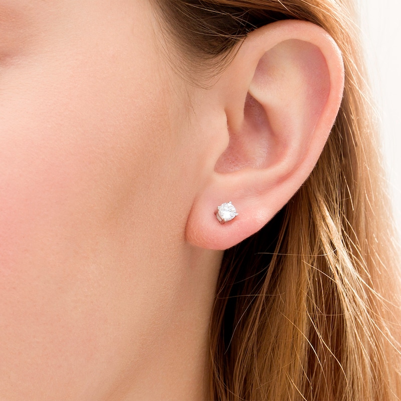 Main Image 2 of 0.58 CT. T.W. Diamond Solitaire Stud Earrings in 14K White Gold