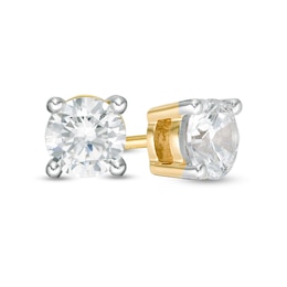 0.69 CT. T.W. Diamond Solitaire Stud Earrings in 14K Gold