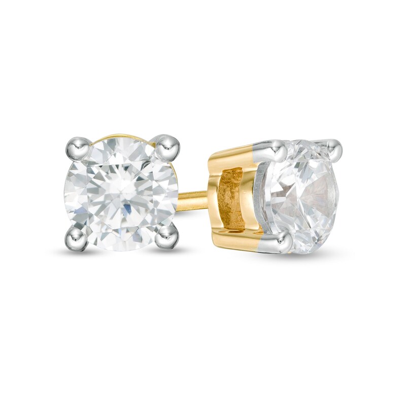 Main Image 1 of 0.69 CT. T.W. Diamond Solitaire Stud Earrings in 14K Gold