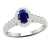 Thumbnail Image 0 of Oval Blue Sapphire and 0.20 CT. T.W. Diamond Frame Scallop Shank Ring in 10K White Gold