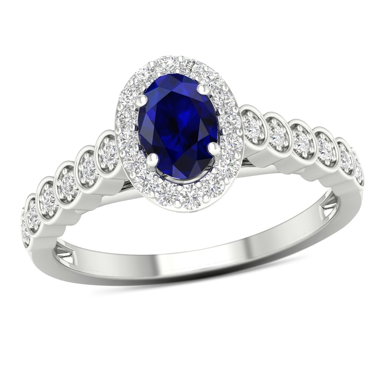 Oval Blue Sapphire and 0.20 CT. T.W. Diamond Frame Scallop Shank Ring in 10K White Gold|Peoples Jewellers