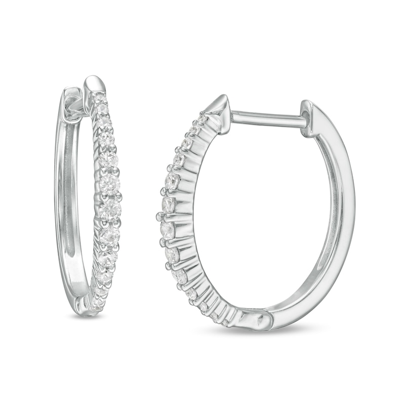 Main Image 1 of 0.25 CT. T.W. Diamond Graduated Oval Hoop Earrings in 10K White Gold