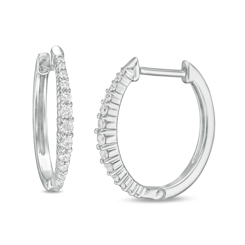 0.25 CT. T.W. Diamond Graduated Oval Hoop Earrings in 10K White Gold