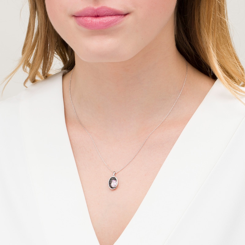 Oval lab-Created Pink Sapphire and 0.085 CT. T.W. White and Black Diamond Pendant in Sterling Silver
