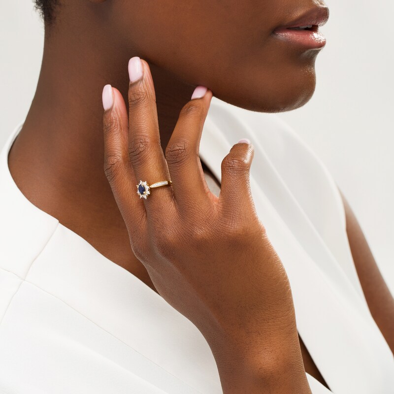 Main Image 2 of Oval Blue Sapphire and 0.10 CT. T.W. Diamond Starburst Frame Vintage-Style Ring in 10K Gold