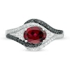 Thumbnail Image 4 of Oval Garnet and 0.085 CT. T.W. White and Black Diamond Bypass Frame Ring in Sterling Silver