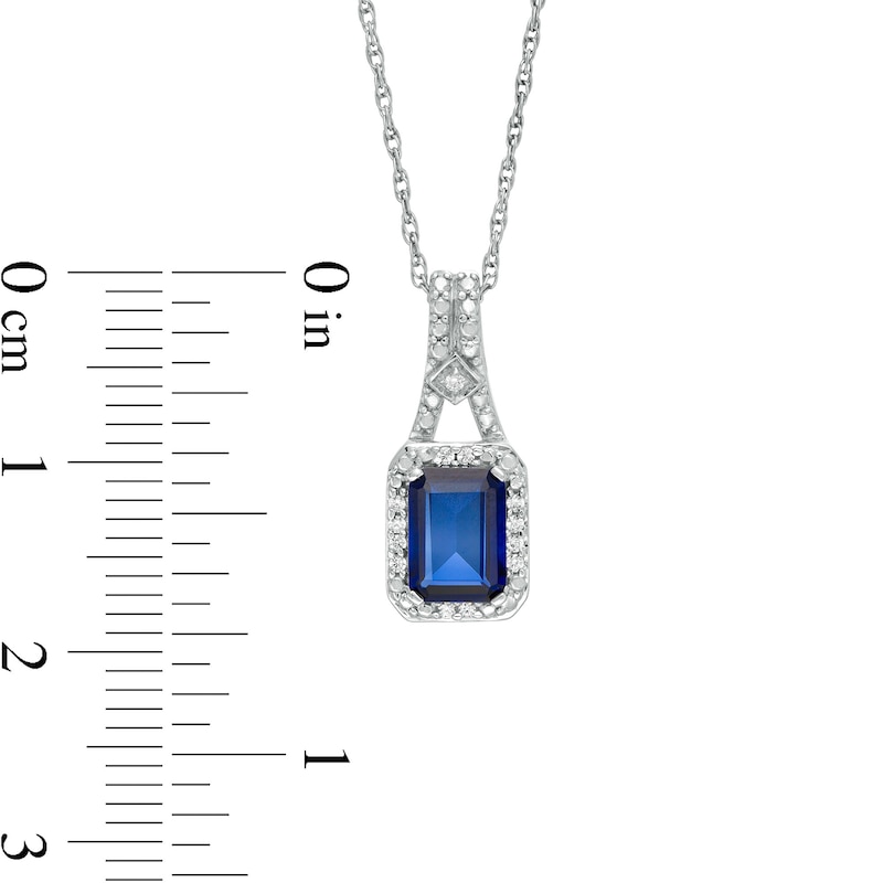 Emerald-Cut Lab-Created Blue Sapphire and 0.04 CT. T.W. Diamond Frame Drop Pendant in Sterling Silver