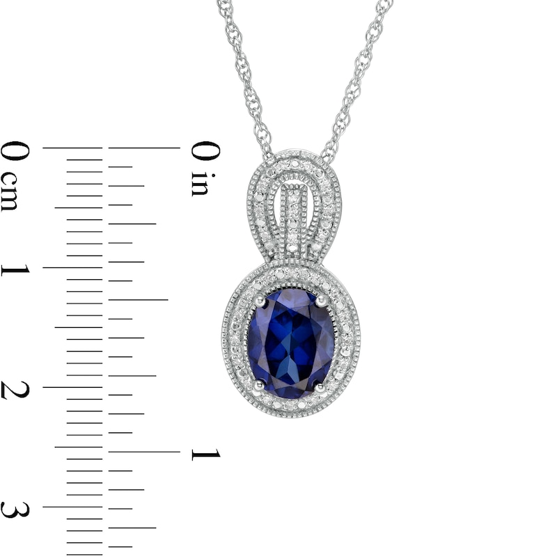 Main Image 3 of Oval Lab-Created Blue Sapphire and 0.065 CT. T.W. Diamond Frame Vintage-Style Drop Pendant in Sterling Silver
