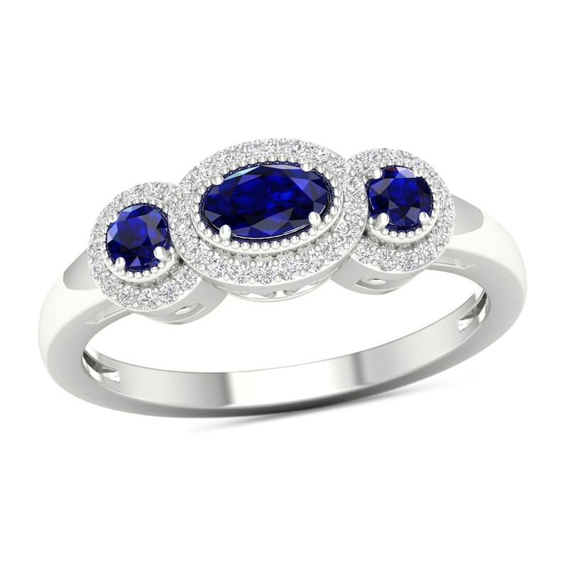 Blue Sapphire and 0.12 CT. T.W. Diamond Frame Three Stone Vintage-Style Ring in 10K White Gold