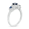 Thumbnail Image 2 of Blue Sapphire and 0.15 CT. T.W. Diamond Frame Three Stone Ring in 10K White Gold