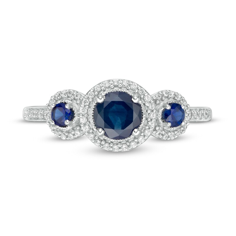 Blue Sapphire and 0.15 CT. T.W. Diamond Frame Three Stone Ring in 10K White Gold