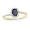 Thumbnail Image 1 of Oval Blue Sapphire and 0.12 CT. T.W. Diamond Frame Bypass Ring in 10K Gold