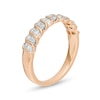 0.12 CT. T.W. Baguette and Round Diamond Stackable Spiral Anniversary Ring in 10K Rose Gold