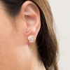 Thumbnail Image 2 of 0.145 CT. T.W. Composite Diamond Swirl Stud Earrings in 10K Gold