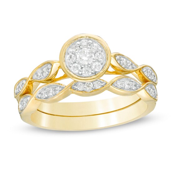 0.29 CT. T.W. Diamond Frame Twist Shank Bridal Set in 10K Gold