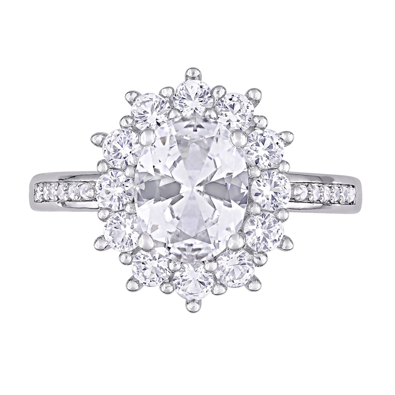 Oval Lab-Created White Sapphire and 0.04 CT. T.W. Diamond Starburst Frame Ring in Sterling Silver