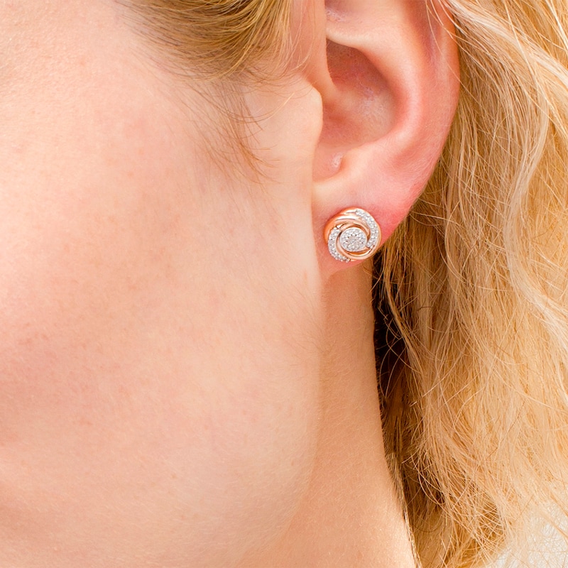 Main Image 2 of 0.145 CT. T.W. Composite Diamond Swirl Stud Earrings in 10K Rose Gold