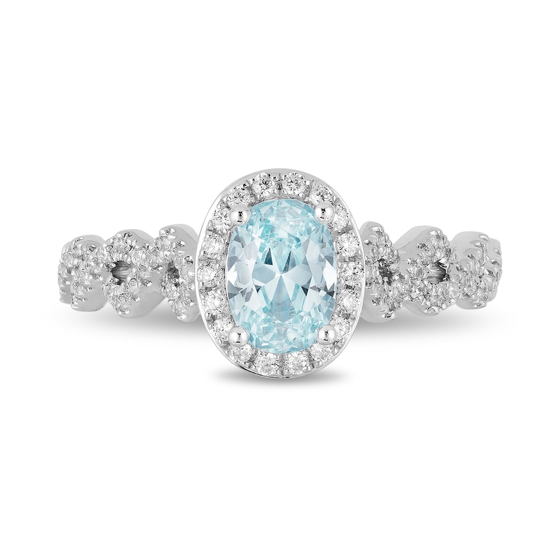 Enchanted Disney Elsa Oval Aquamarine and 0.23 CT. T.W. Diamond Frame Twist Shank Engagement Ring in 14K White Gold|Peoples Jewellers