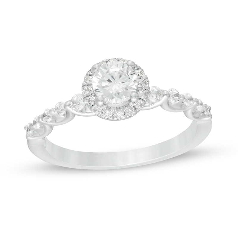 0.69 CT. T.W. Certified Canadian Diamond Frame Engagement Ring in 14K White Gold (I/I2)