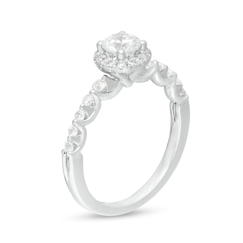 0.69 CT. T.W. Certified Canadian Diamond Frame Engagement Ring in 14K White Gold (I/I2)