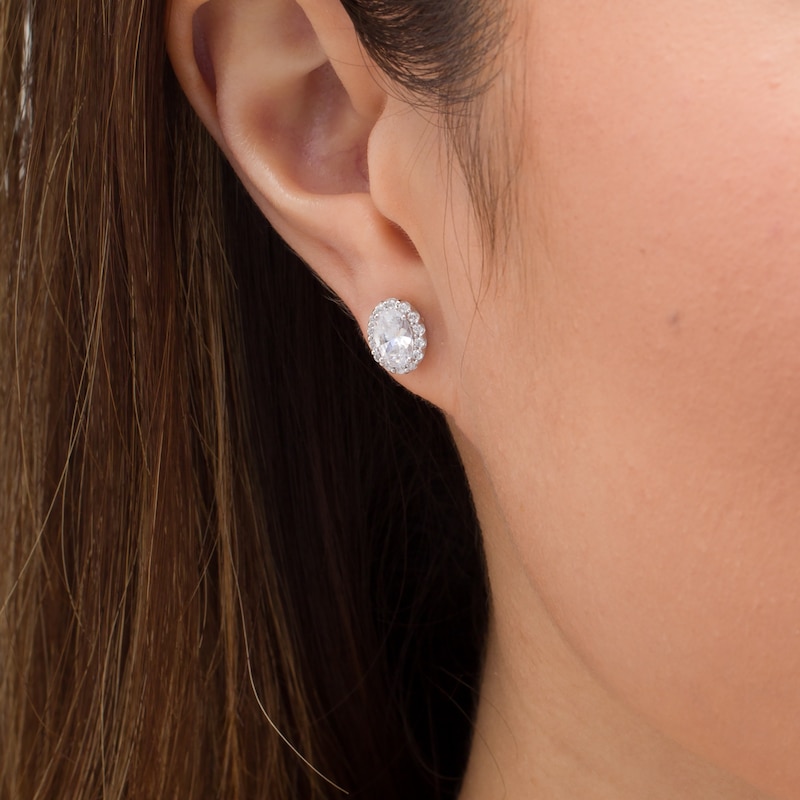 Main Image 2 of 1.45 CT. T.W. Certified Oval Diamond Frame Stud Earrings in 14K White Gold (I/SI2)