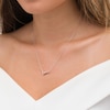 Thumbnail Image 1 of Love + Be Loved 0.10 CT. T.W. Diamond Loop Necklace in 10K Two-Tone Gold