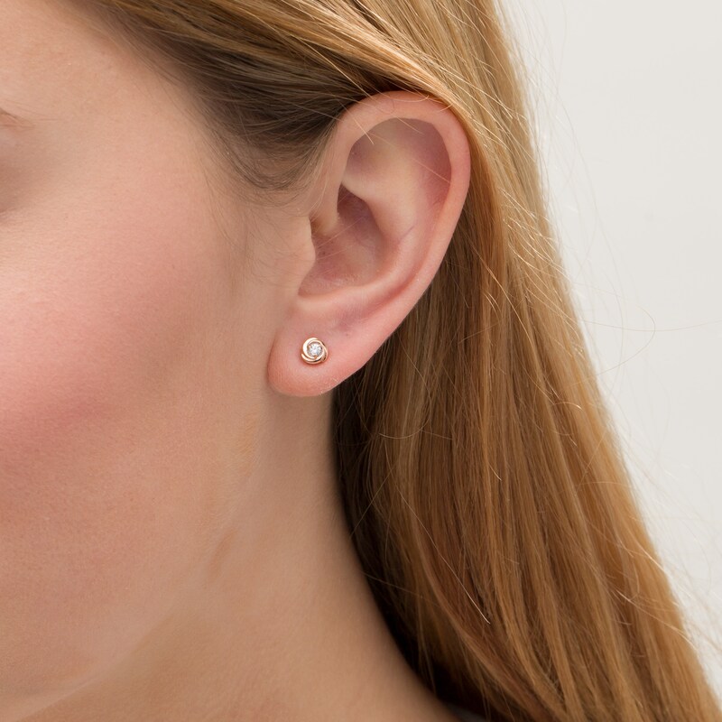 Main Image 2 of Centre of Me 0.10 CT. T.W. Diamond Love Knot Stud Earrings in 10K Rose Gold