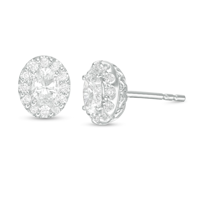 Main Image 1 of 0.95 CT. T.W. Certified Oval Diamond Frame Stud Earrings in 14K White Gold (I/SI2)