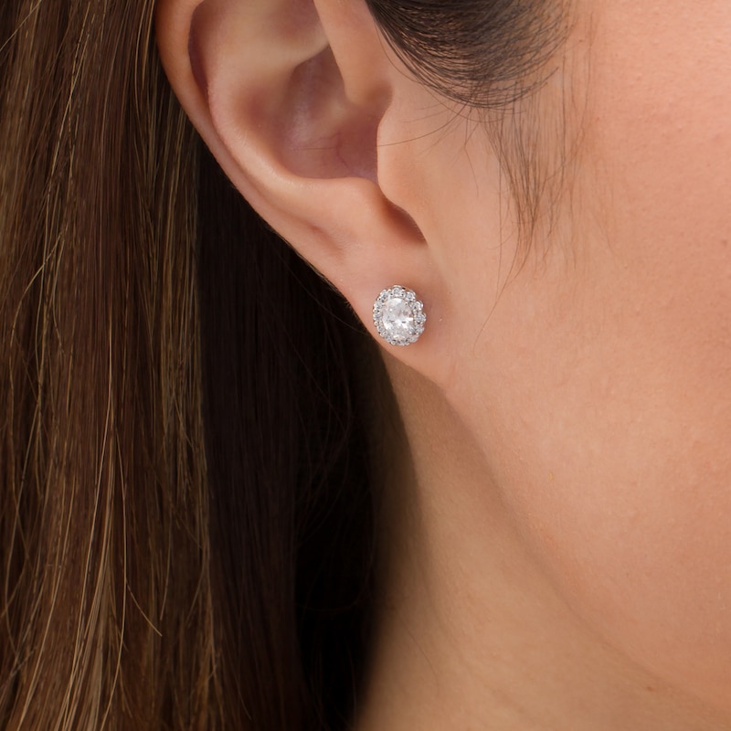 Main Image 2 of 0.95 CT. T.W. Certified Oval Diamond Frame Stud Earrings in 14K White Gold (I/SI2)