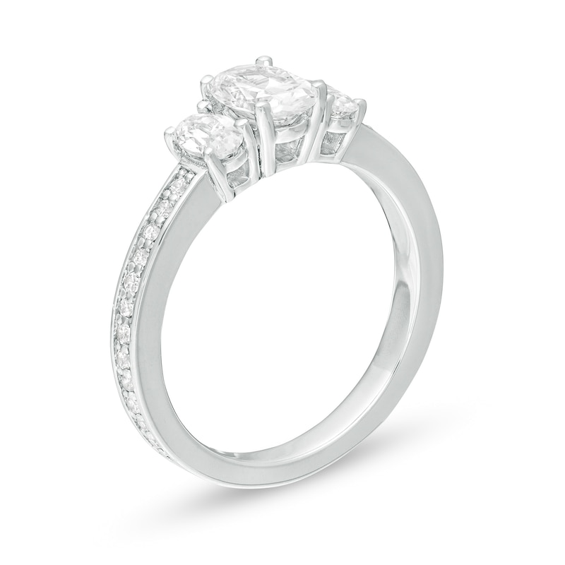 1.46 CT. T.W. Certified Oval Lab-Grown Diamond Lined Past Present Future® Engagement Ring in 14K White Gold (G/SI2)