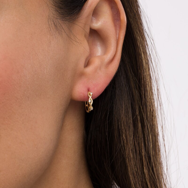 Main Image 2 of Cubic Zirconia Three Stone Twisted Loose Braid Huggie Hoop Earrings in 14K Gold